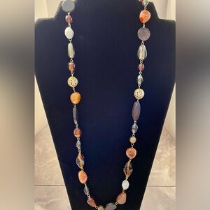 Vintage polished agate glass bead necklace. Has filigree gold beads.. 34 inches